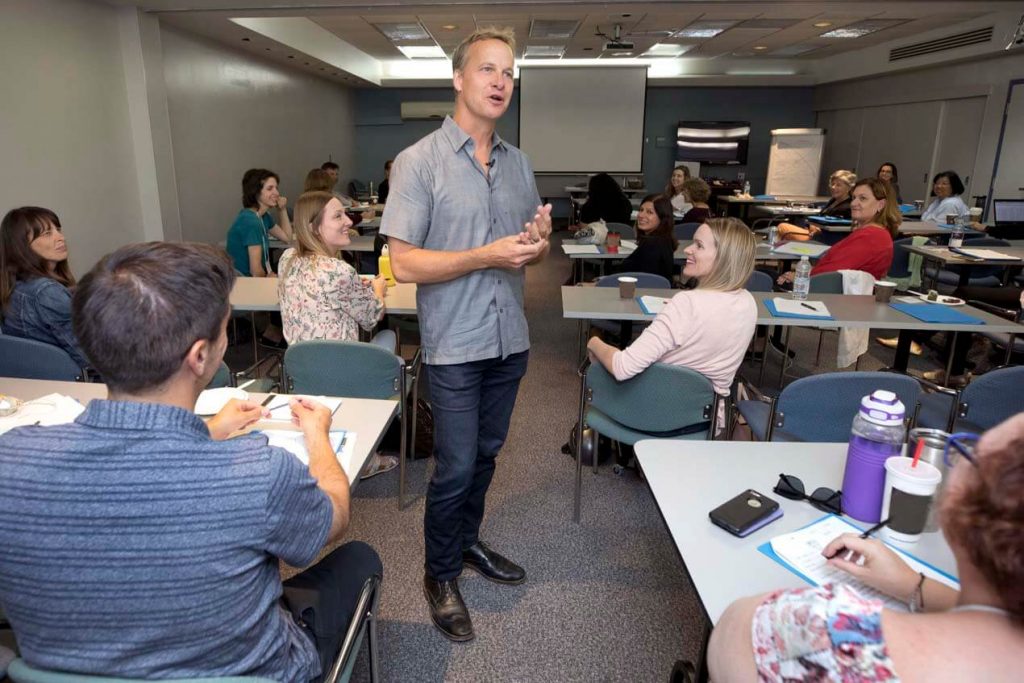 teacher speaking to a classroom