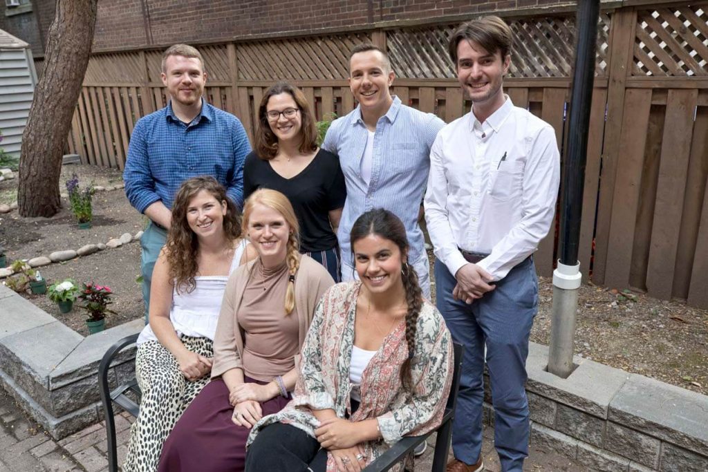 group of young adults smiling