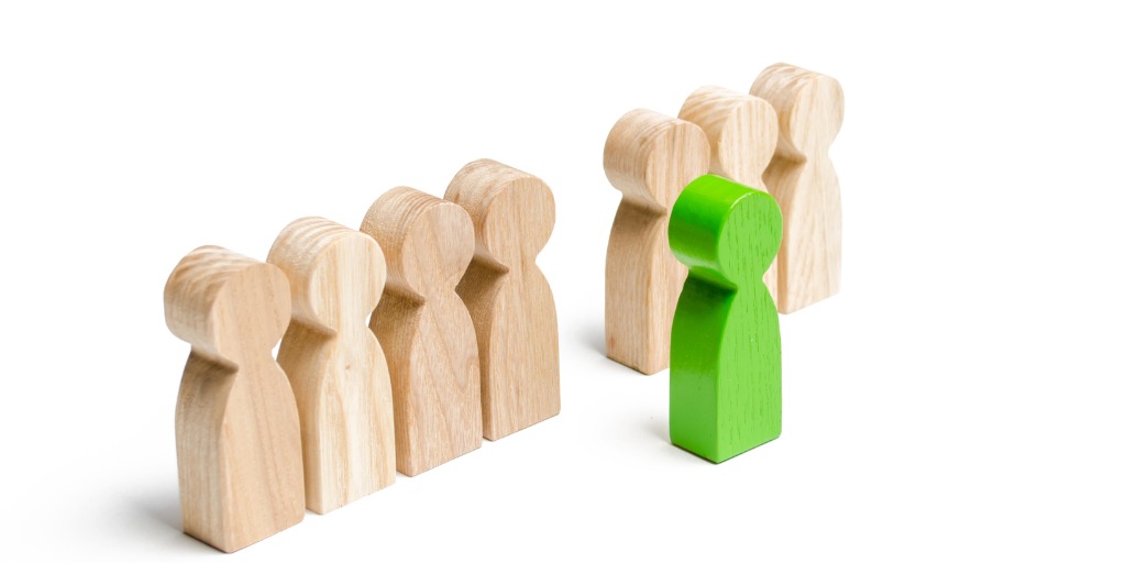 wooden pegs in a row with one green in front showing supervisor certificate