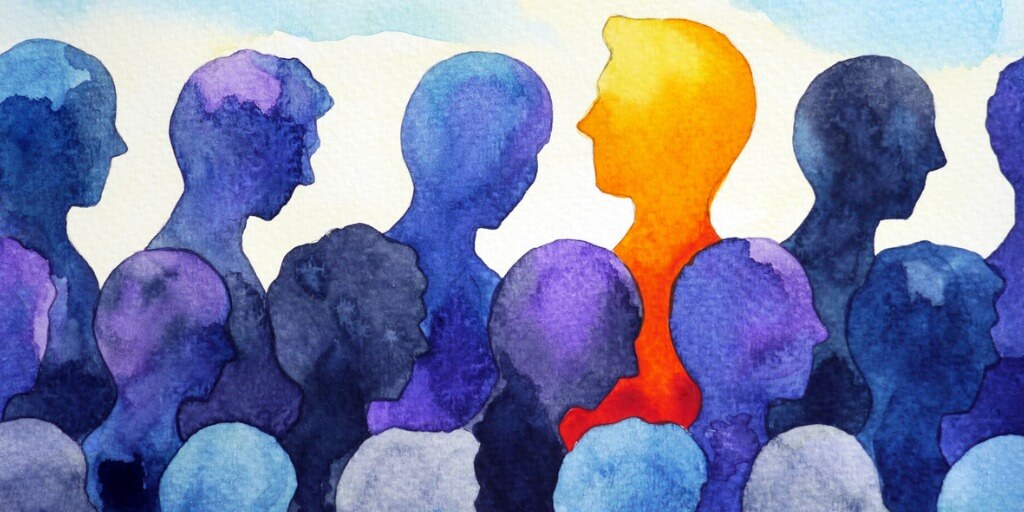 blue people silhouettes with one orange Dialectical Behaviour Therapy