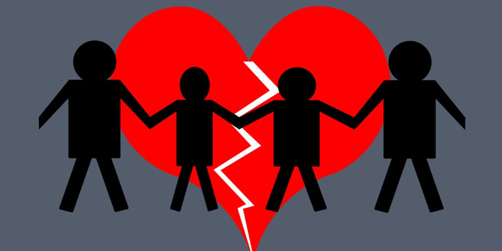 broken heart with family holding hands for creative interventions for children of divorce