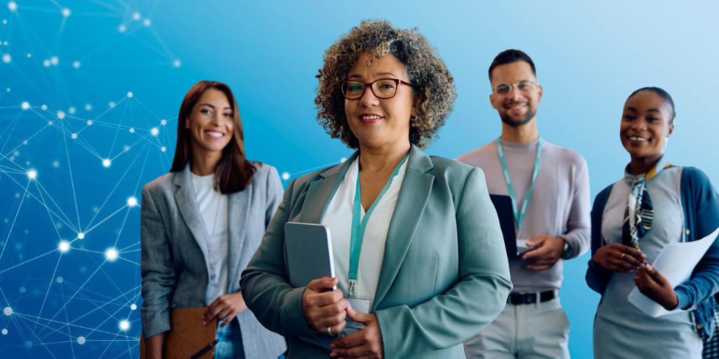 image of four professionals looing at camera