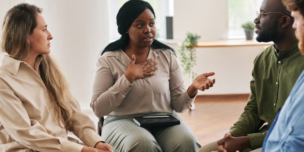 image of people connecting and talking using debriefing skills