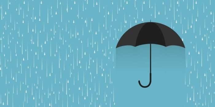 black umbrella in the rain for grief support for clients who use substances
