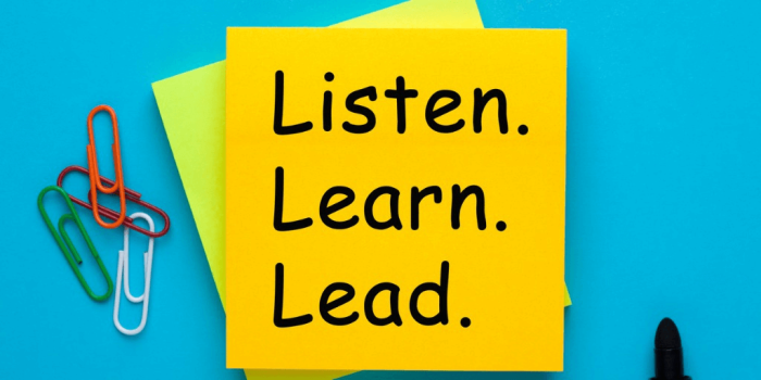image of post it note with listen learn lead on it for leadership training