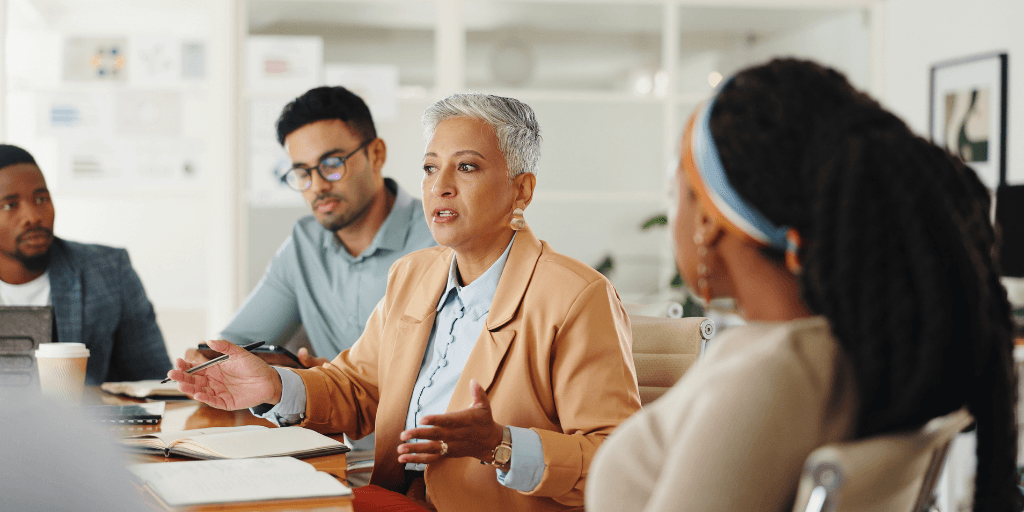 leader speaking to team for change leadership